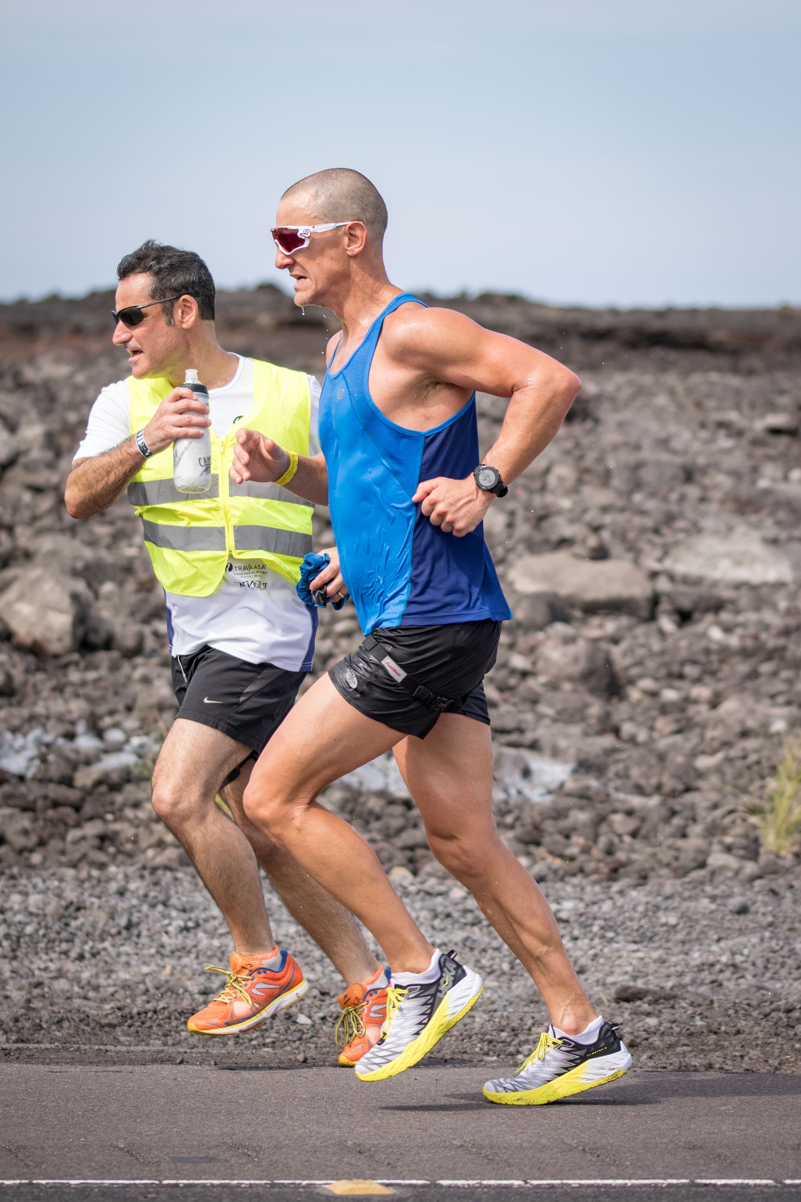 Running the lava fields on Day 3 with my pacer