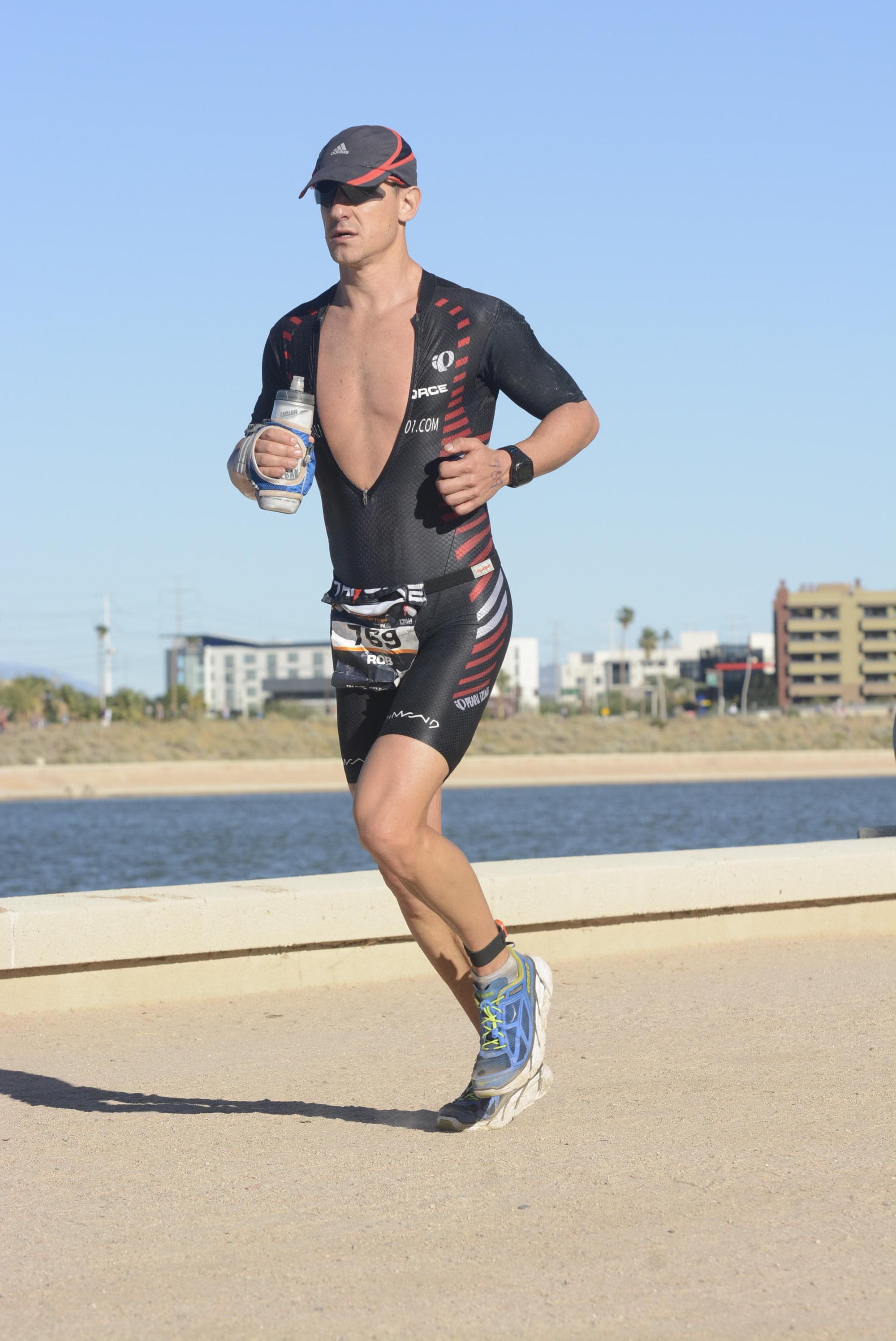 Rob running along Tempe Town Lake at IMAZ